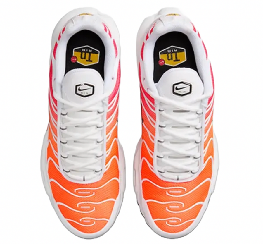 white and orange air max plus