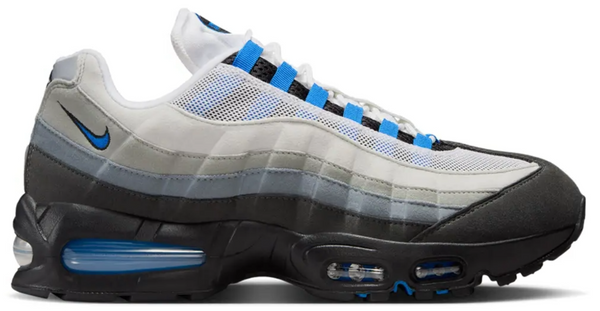Gray and black sneaker with blue accents on a white background